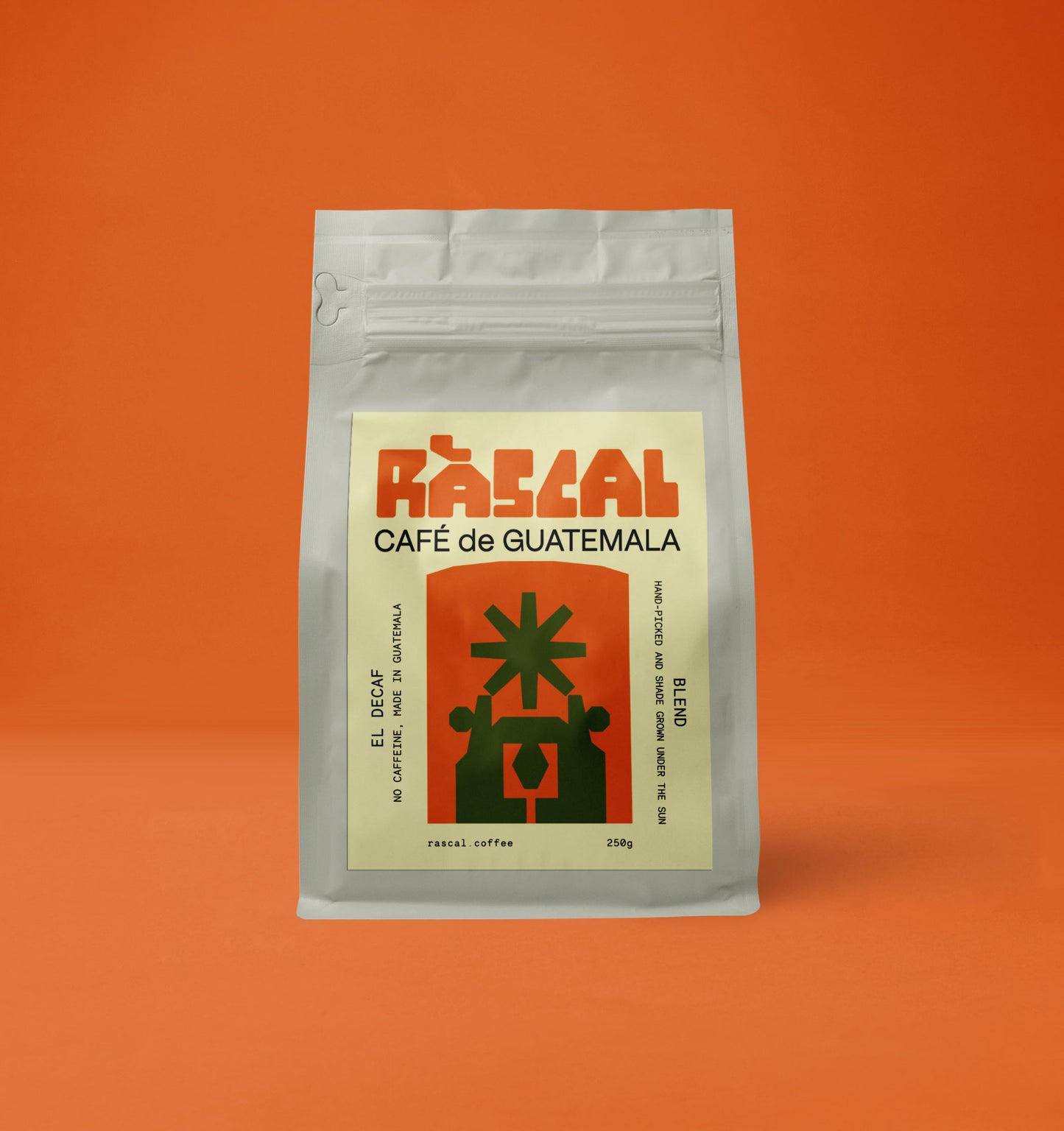 A packaged bag of Ráscal decaf Guatemala coffee with a brutalist graphic on the label.
